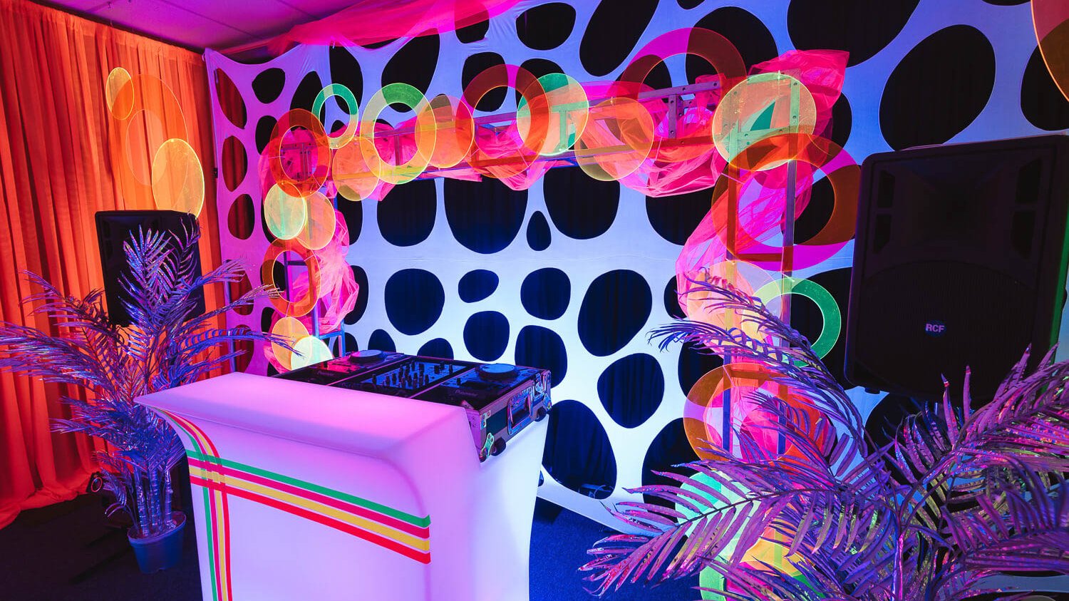 DJ booth at neon themed event
