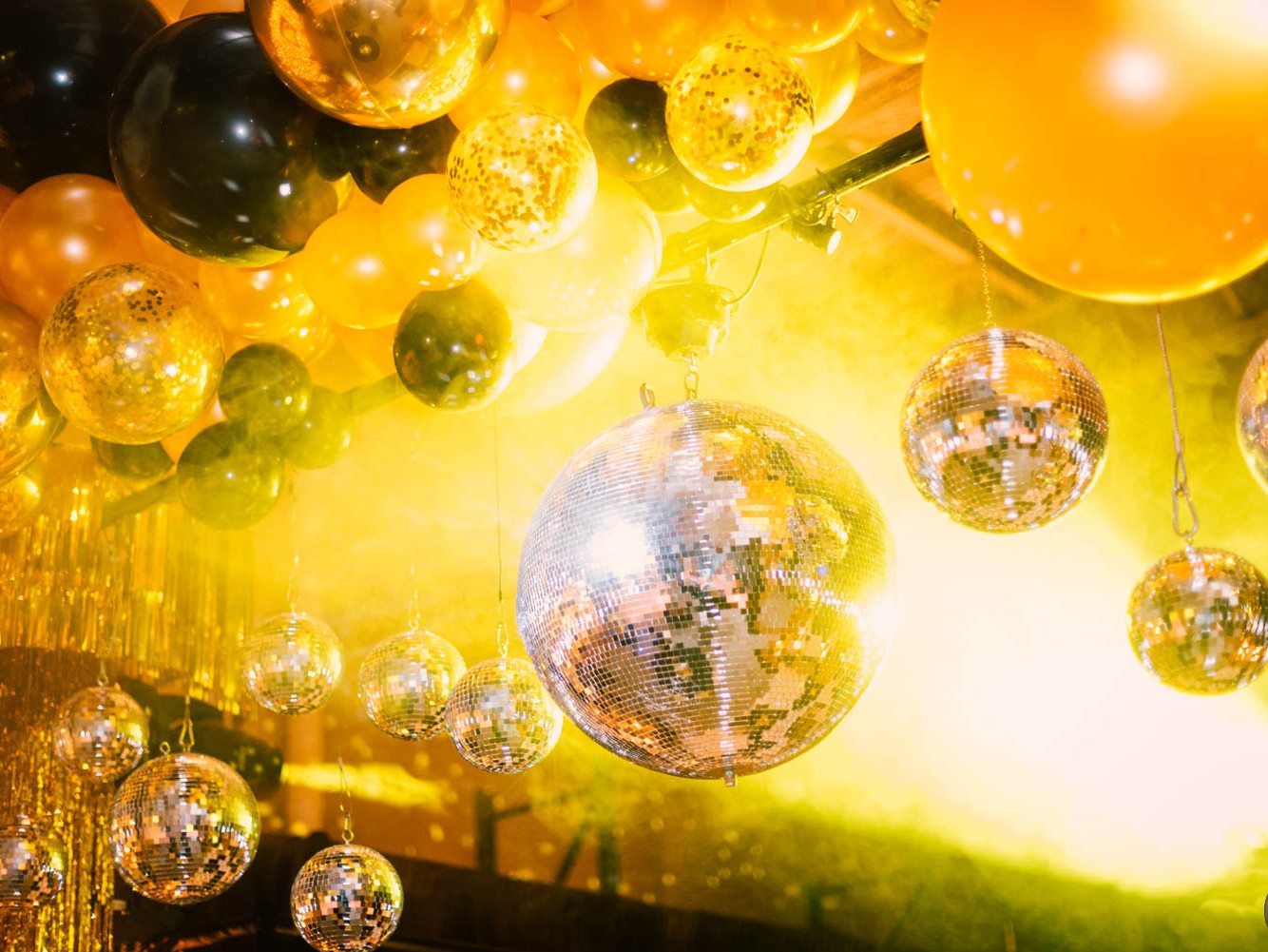 studio 54 themed party with silver mirror balls