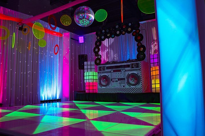 80s themed event illuminated led dance floor and 80s themed dj booth
