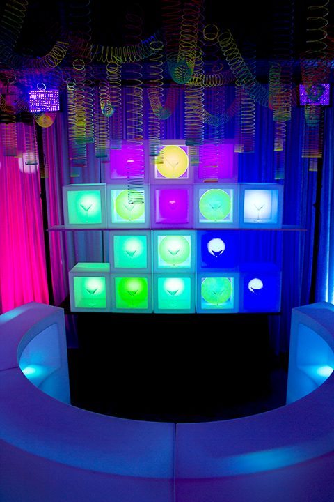 80s themed party illuminated cubes and decor