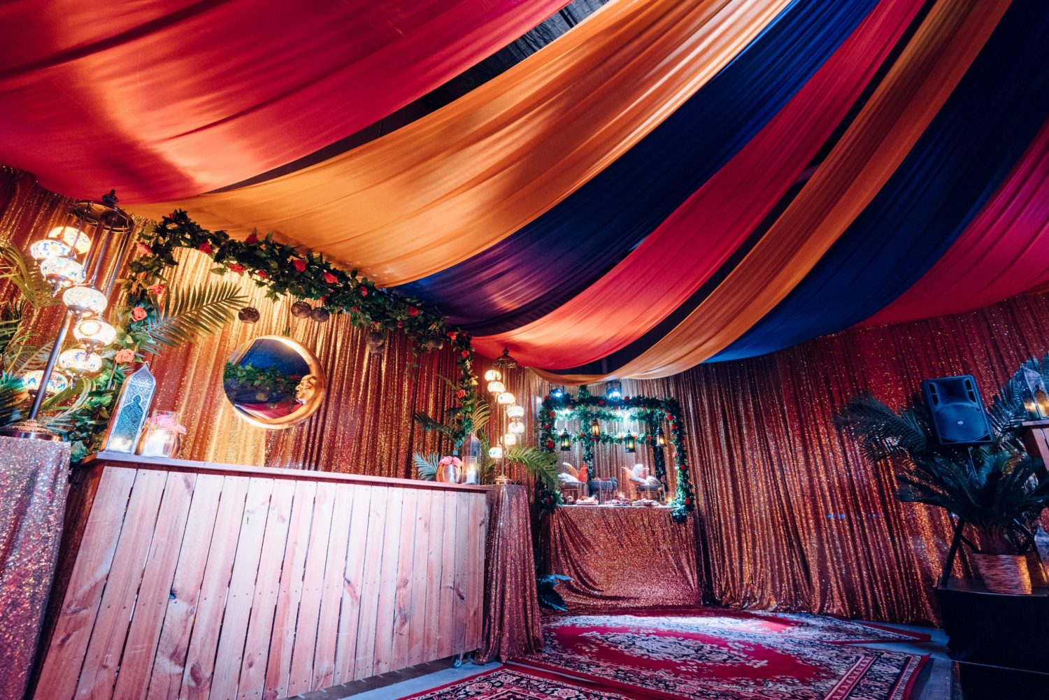 arabian nights theme ceiling draping, wooden bar, carpet
