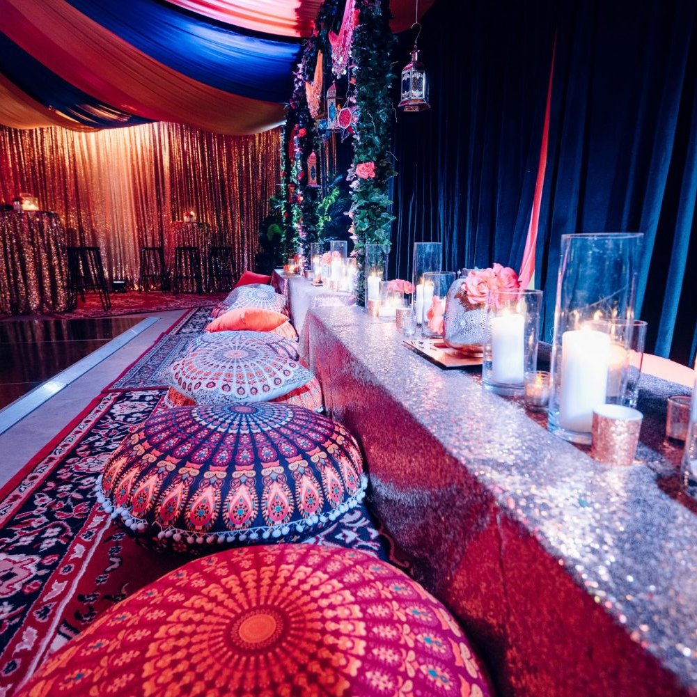 arabian nights themed event table setup with cushions