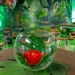 red lotus flower in front of forest backdrop party hire melbourne