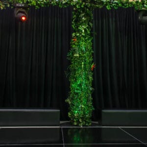 black drape with vine covered column on dance floor hire melbourne