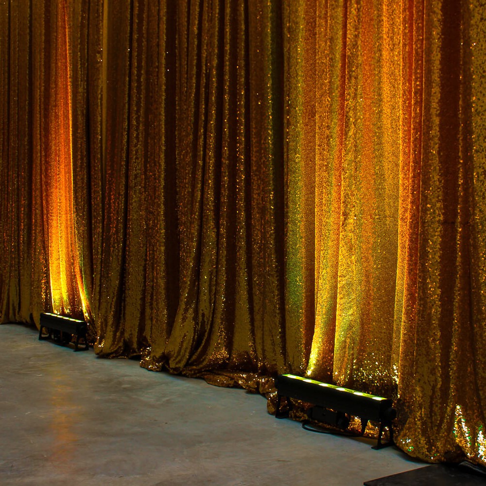 led strip light infront of gold sequin drape hire melbourne