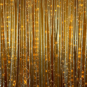 Gold metallic drape with fairy lights