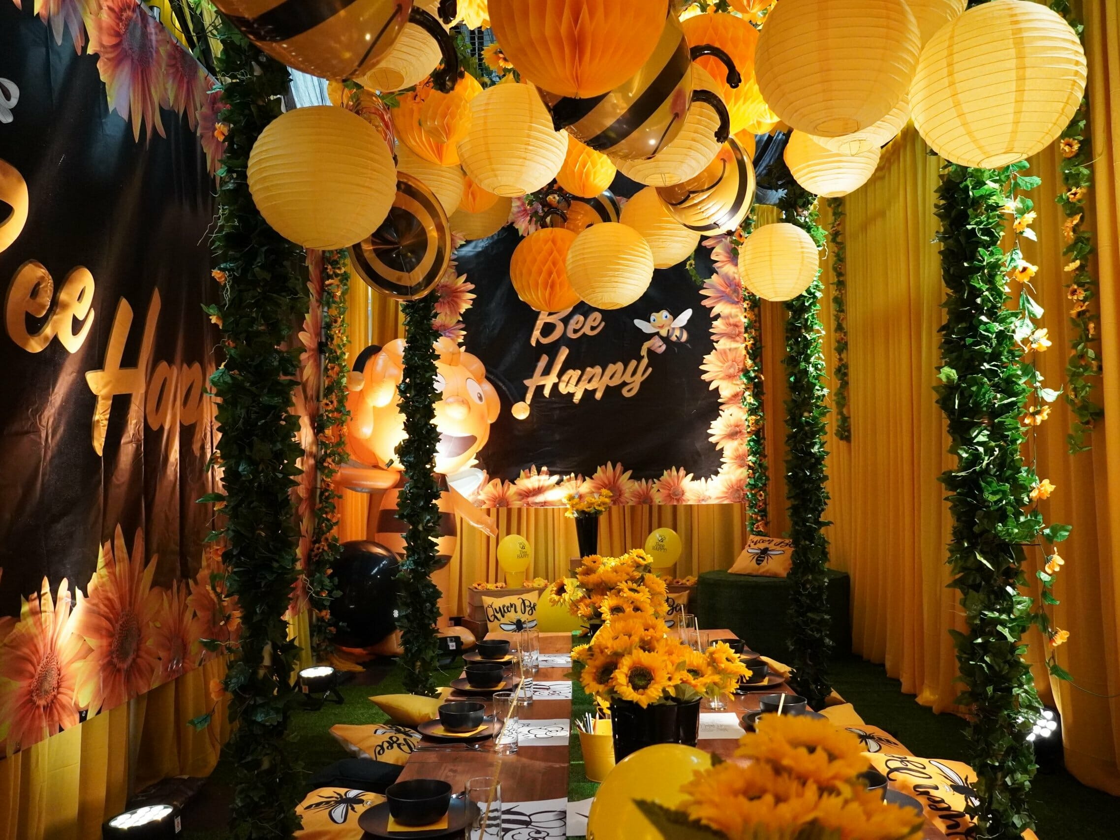 Bumble Bee Party Theme balloons, table setup, table decor and greenery