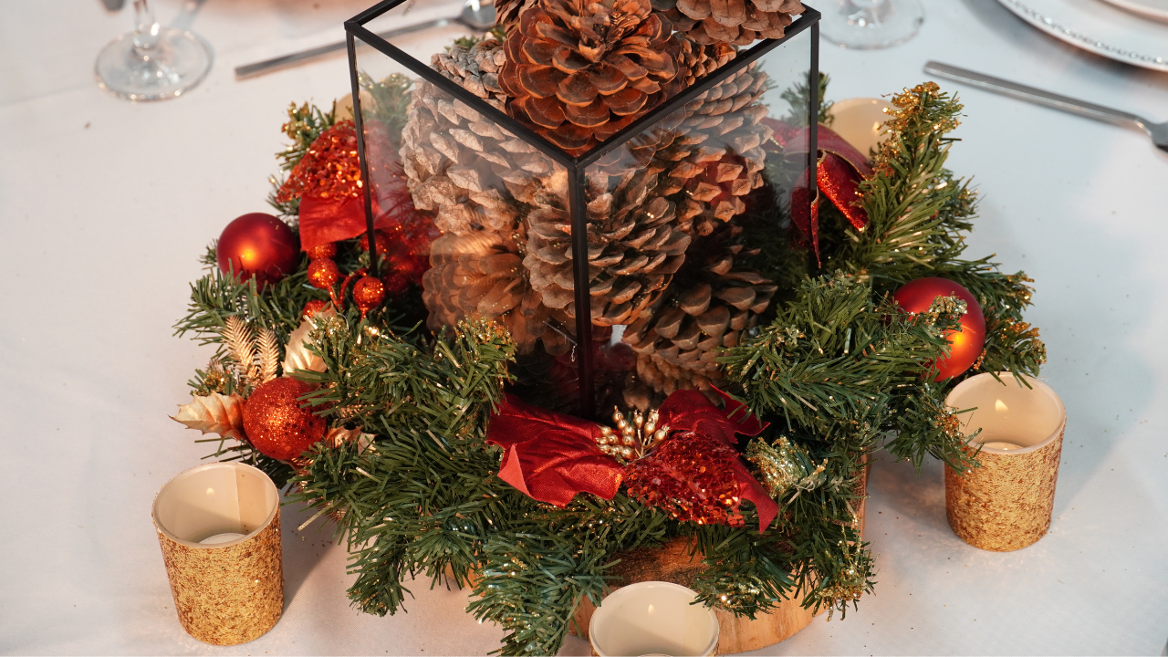 Christmas Centrepiece - Pine cones with red christmas wreath