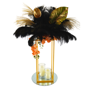 floral centrepiece with black feathers and gold stand