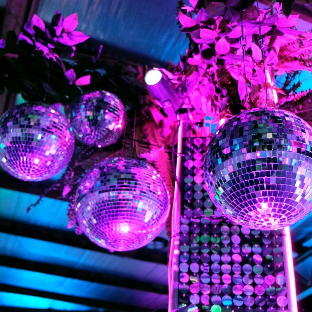 mirror balls, sequin panels, neon lights theme transformation cost