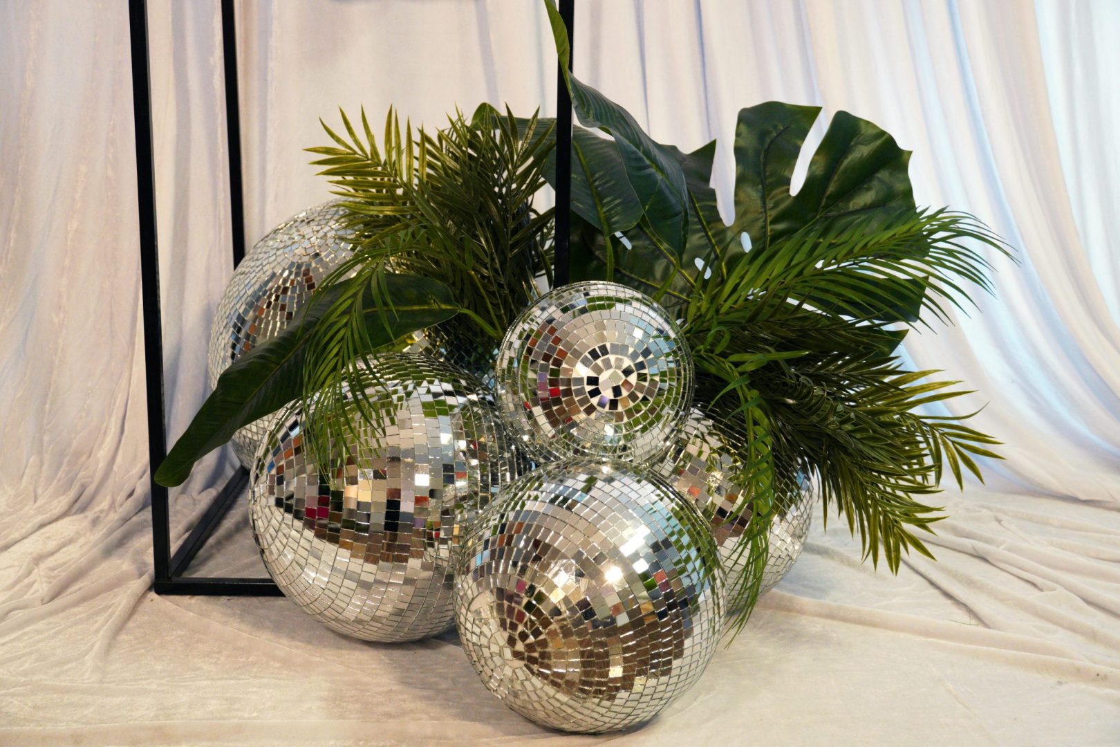 silver mirror balls and greenery