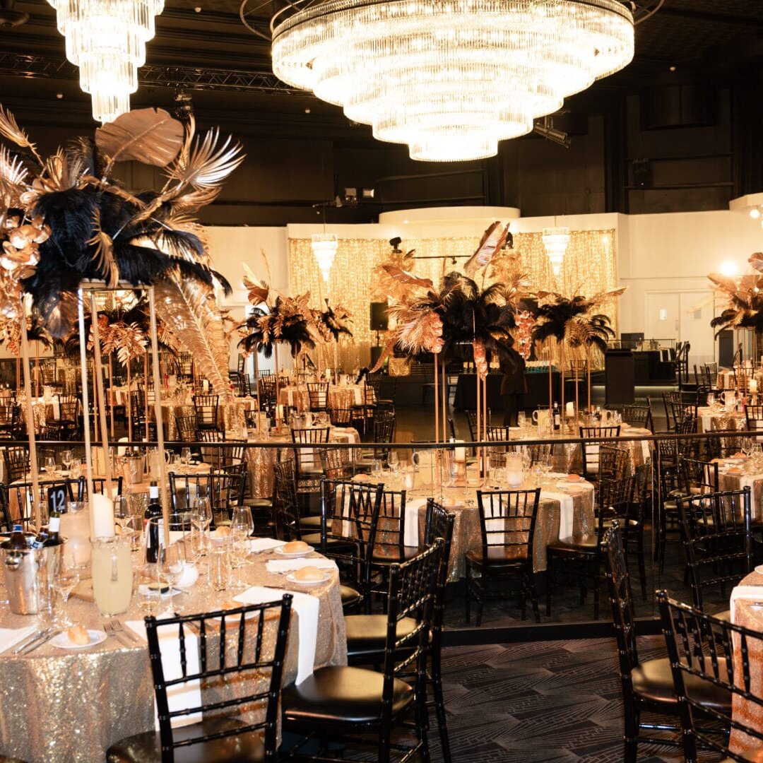 black and gold floral centrepieces at 1920s themed end of year gala