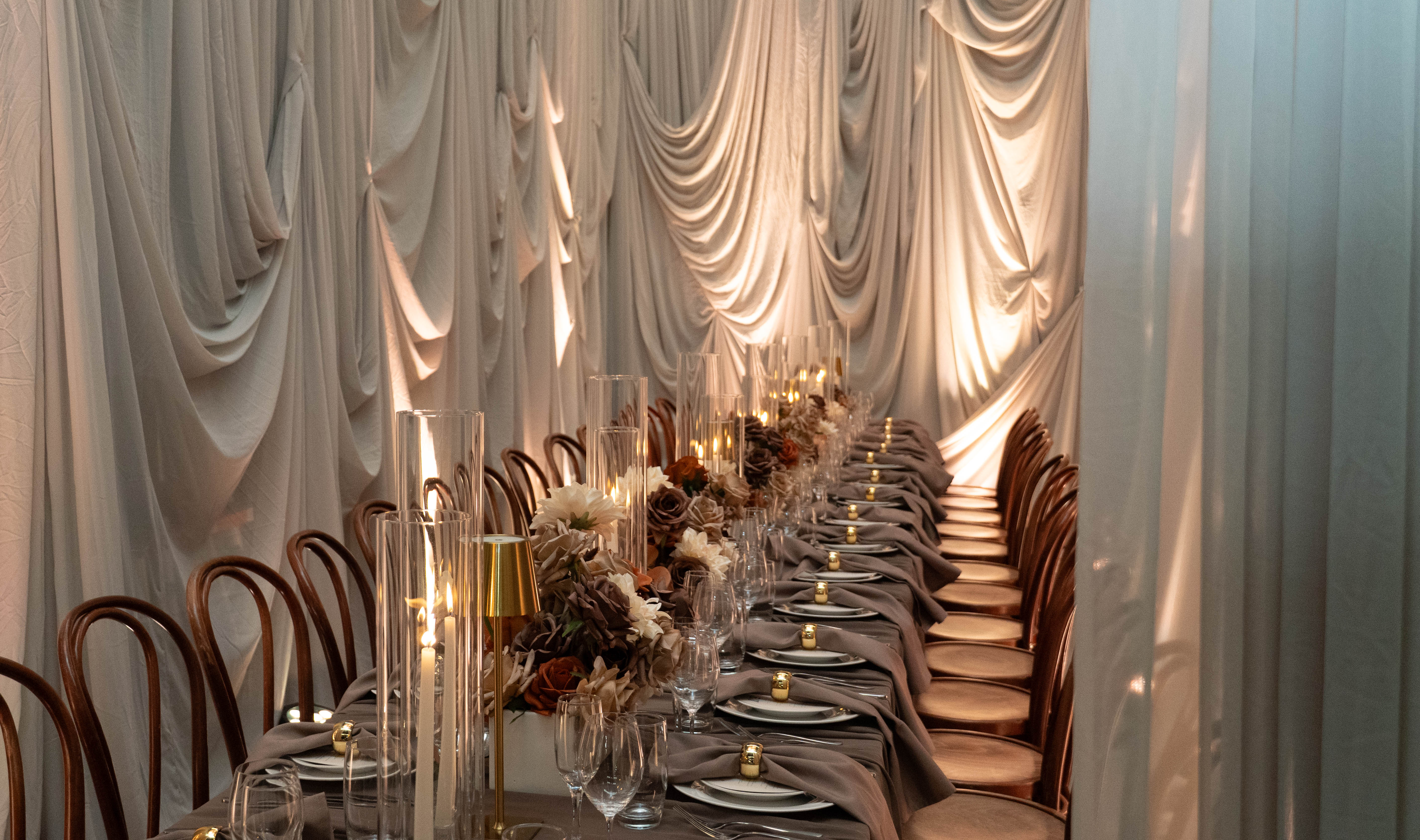 mocha mousse styled event with dramatic draping and brown colour palette