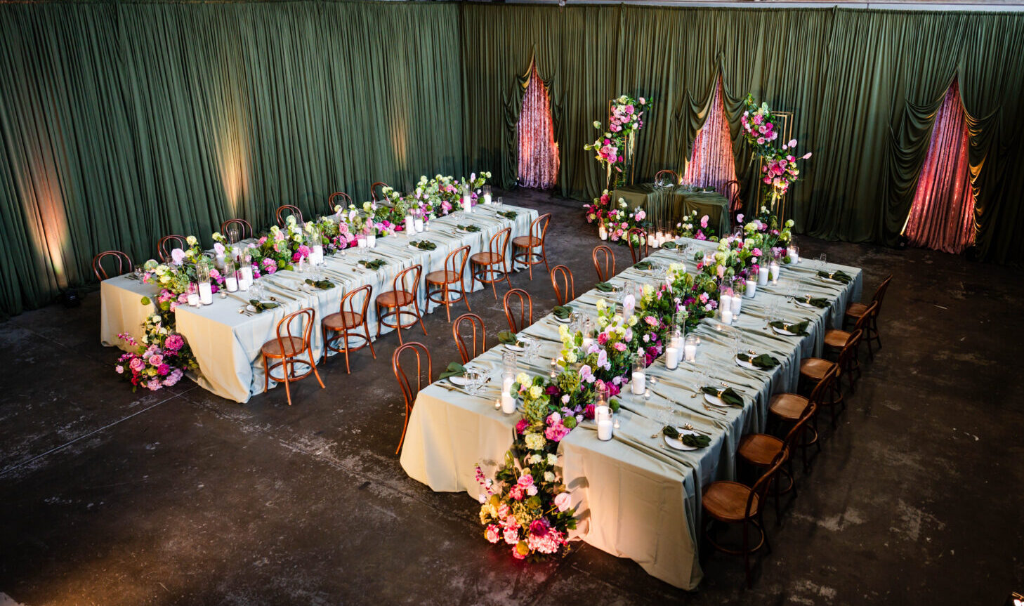 pink and green wedding styling with draping Melbourne, wedding ceremony backdrop green draping pink florals, romantic wedding flowers pink and green colour palette, wedding floral installation with greenery and blush tones, elegant wedding draping and floral styling Melbourne, lush green draping wedding backdrop with pink flowers, modern wedding styling pink florals and greenery, wedding ceremony setup floral arch alternative pink green, soft pink and green wedding theme inspiration, wedding styling Melbourne floral and drape design, long table wedding styling pink and green florals, wedding reception table greenery and pink floral runner, romantic wedding tablescape candles and florals pink green