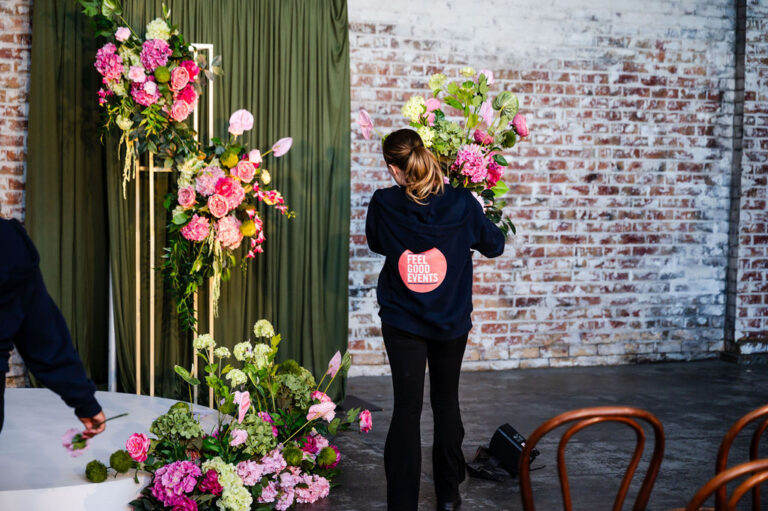 How We Work, Feel Good Events team member setting up wedding styling and décor for a wedding ceremony in Melbourne.