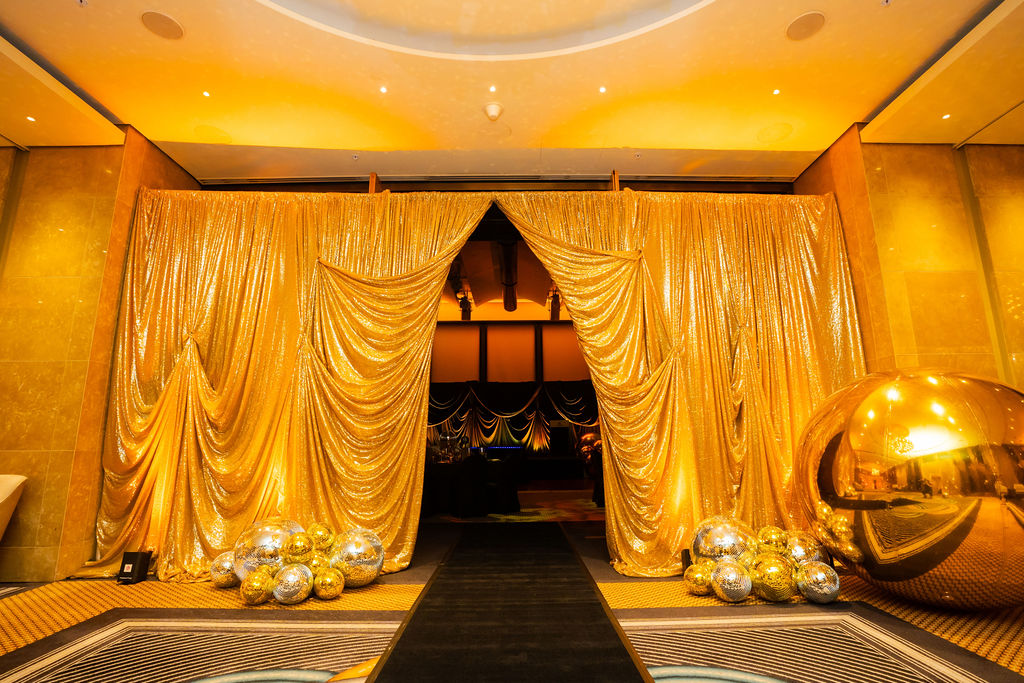 Corporate awards night styling Melbourne at the TEEG 2026 Awards Night Gala at Crown Melbourne, featuring shimmer styling, draping, lighting and full event transformation.