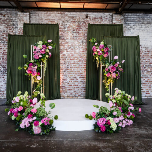 This colour palette blends soft pink tones with layered greens to create a look that feels balanced, warm, and grounded. Deeper pinks add richness and contrast, while lighter blush tones soften the overall palette and keep it from feeling too heavy. The greens range from dark, almost forest tones through to softer, muted shades, giving the palette depth and structure rather than sitting flat. Touches of warm metallic and candlelight tones bring subtle warmth through the space, helping the colours shift naturally from day into evening. Together, the combination feels fresh but considered, with enough contrast to define the space, while still keeping everything connected.