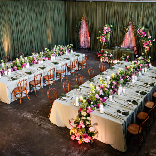 pink and green wedding styling with draping Melbourne, wedding ceremony backdrop green draping pink florals, romantic wedding flowers pink and green colour palette, wedding floral installation with greenery and blush tones, elegant wedding draping and floral styling Melbourne, lush green draping wedding backdrop with pink flowers, modern wedding styling pink florals and greenery, wedding ceremony setup floral arch alternative pink green, soft pink and green wedding theme inspiration, wedding styling Melbourne floral and drape design, long table wedding styling pink and green florals, wedding reception table greenery and pink floral runner, romantic wedding tablescape candles and florals pink green